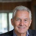 Professional headshot of a mature man, Robert Johnson, looking healthy and alert, a client of NutriLife Indonesia.